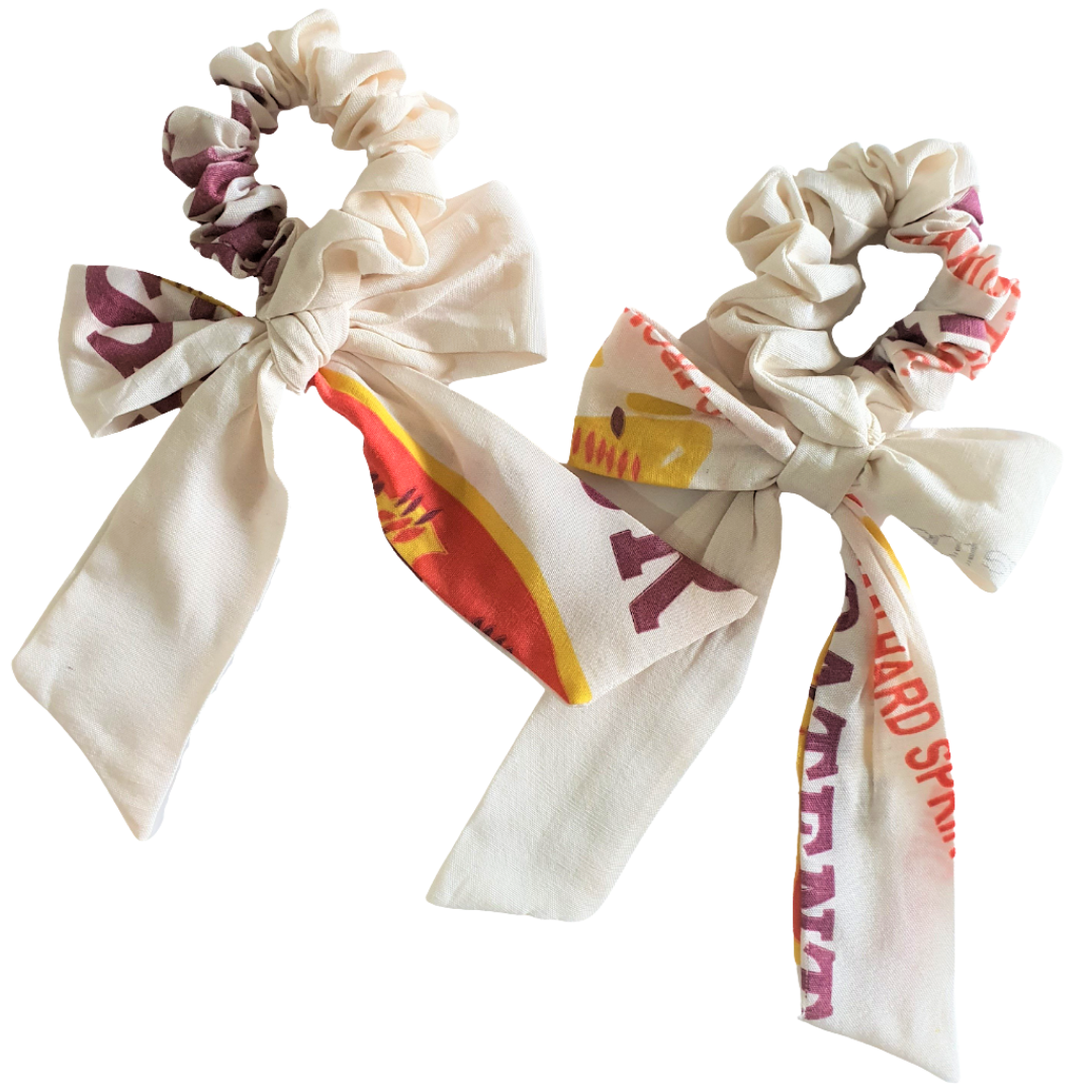 The Isolde Bow Scrunchie: Oversized straight bow scrunchie in upcycled katsa and retaso.